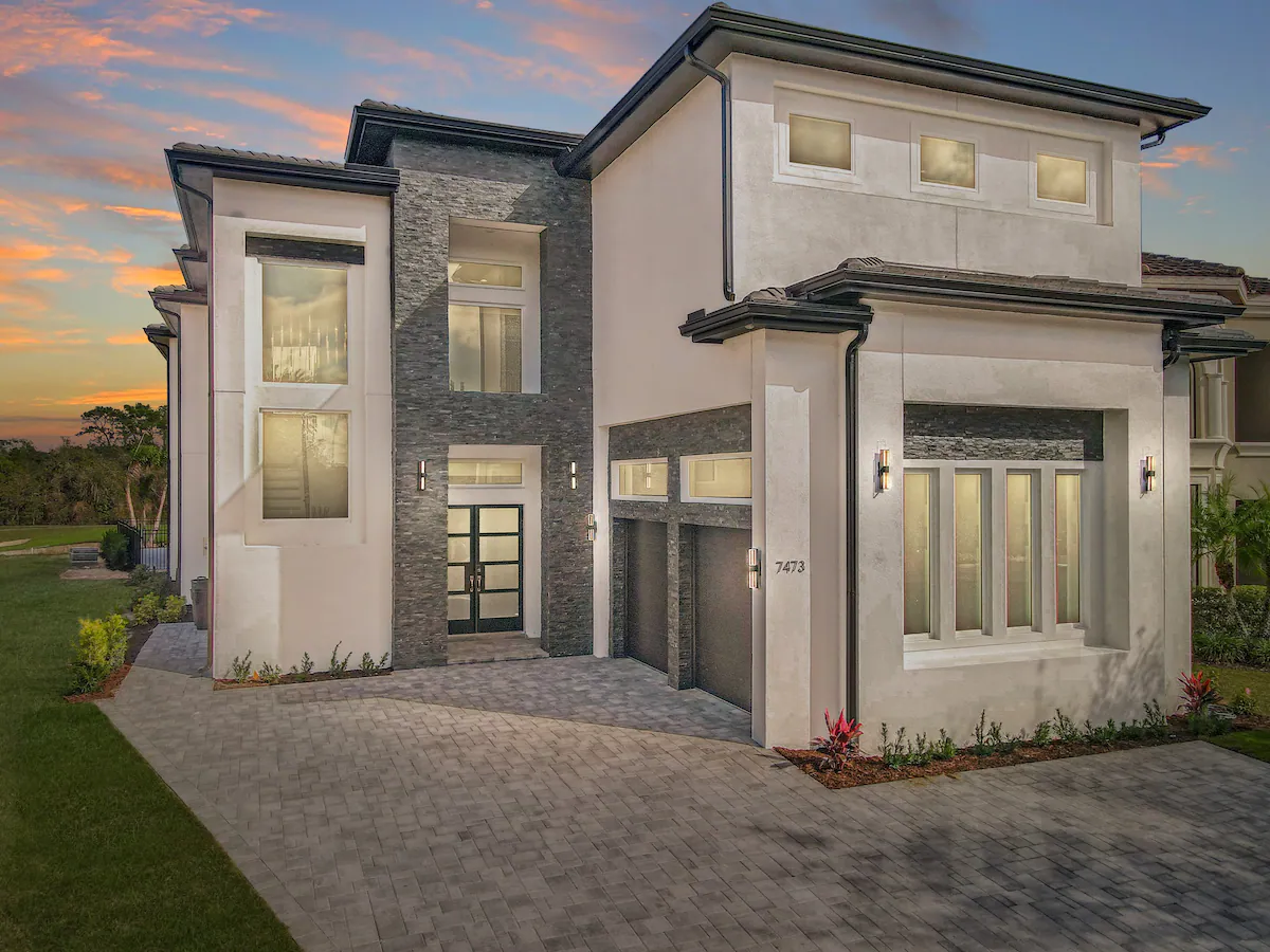 A modern Orlando vacation home at sunset.